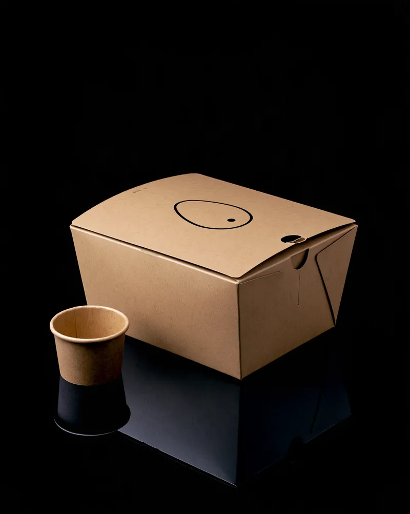 The Egg Company folded kraft fiber box.